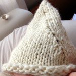 Campanellino, a pixie baby hat topped with a little bell